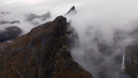 Aerial-view-of-Segla-mountain-above-the-sky,-Norway-during-summer