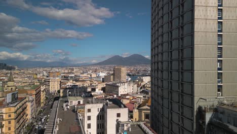 Aerial-Drone-Shot-Reveals-Naples-Cityscape-with-Mount-Vesuvius-in-Background