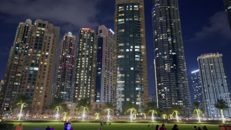 Pan-shot-of-the-Dubai-skyline-with-the-Burj-Khalifa,-Dubai-Fountain,-and-Address-Hotel,-United-Arab-Emirates