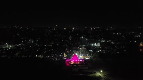 Aerial-drone-view-showing-many-residential-houses-and-Ramnath-Mahadev-temple-celebrating-Mahashivratri