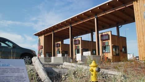 Vehicle-pulling-up-to-pay-the-ferry-toll-to-Whidbey-Island