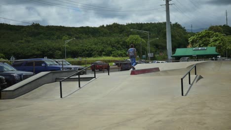 Skateboarder-does-a-trick-at-the-skatepark-in-Hawaii