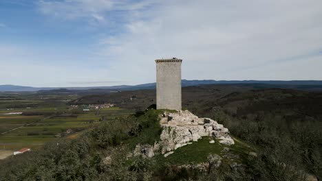 Historic-Tower-Da-Pena,-panoramic-view,-Xinzo-de-Limia,-Ourense,-Galicia,-Spain---aerial