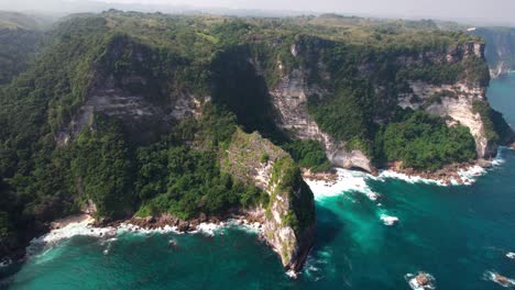 Limestone-Cliffs-Covered-With-Lush-Vegetation-On-Coast-Of-Bali-In-Indonesia
