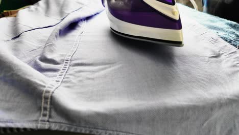 Ironing-Clothes-On-an-Ironing-Board