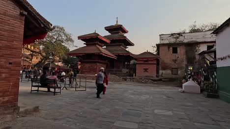 Opening-shot-walking-into-a-temple-area-in-Durbar-Square,-Kathmandu-Nepal