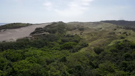 Aerial-view-of-sand-dunes-and-dry-forest-in-Fiji's-first-national-park
