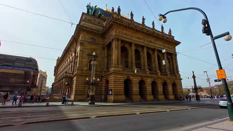 Exterior-of-State-Opera-building-in-Prague-on-sunny-day,-slow-motion-view