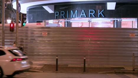 A-new-Irish-fashion-retailer-brand-Primark-store-seen-under-construction-as-pedestrians-and-vehicles-drive-by-during-nighttime