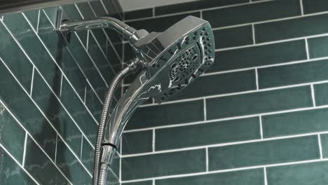 Newly-installed-shower-head---pulling-back-and-tilting-to-level