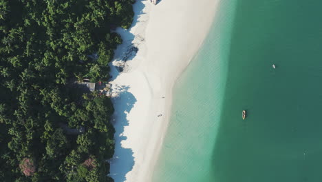 Description:-A-drone-ascends,-unveiling-the-breathtaking-beauty-of-Campeche-Beach-on-Campeche-Island,-Florianopolis,-Santa-Catarina,-Brazil