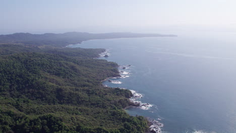 Aerial-establishing-shot-over-the-Cebaco-Island-jungle-and-shoreline-at-summer
