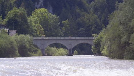 Historic-stone-bridge-over-a-picturesque-river-in-sunshine
