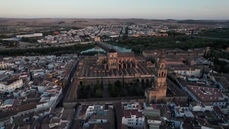 majestic-aerial-view-of-mosque-cathedral,-Cordoba-City,-spain-during-golden-hour