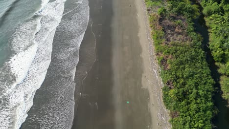 Aerial-view-of-solitary-Playa-Cuevita-near-El-Valle-in-the-lush-Chocó-department-on-the-scenic-Pacific-Coast-of-Colombia