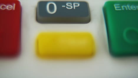 A-macro-close-up-shot-of-a-pin-pad-numbers-and-letters-on-colorful-buttons,-smooth-tilt-down-movement,-Full-HD-video,-super-slow-motion,-blurry-depth-of-field