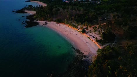 4K-Cinematic-nature-drone-footage-of-a-panoramic-aerial-view-of-the-beautiful-beaches-and-mountains-on-the-island-of-Koh-Lanta-in-Krabi,-South-Thailand,-during-sunset
