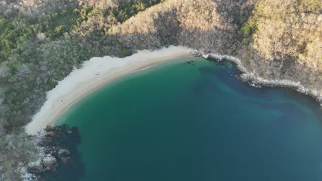 El-Organo-Bay,-an-almost-pristine-shoreline-nestled-along-Pacific-coast-of-Mexico,-situated-in-Huatulco,-Oaxaca