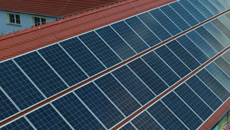 Solar-Panels-on-red-tile-roof-during-sunny-day-outdoors-in-nature