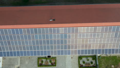 Solar-Panel-Cells-On-The-Roof-Tiles---Drone-Shot