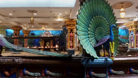 Peacock-Sculptures-On-Railing-Inside-Main-Temple-Of-Batu-Caves-In-Gombak,-Malaysia