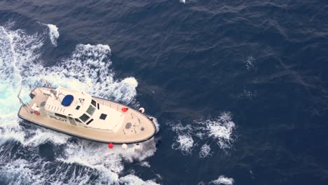 Pilot-boat-along-side-a-ship-in-order-to-guide-the-vessel-into-port