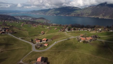 Transportation-moving-across-beautiful-Swiss-Countryside,-Aeschi-bei-Spiez