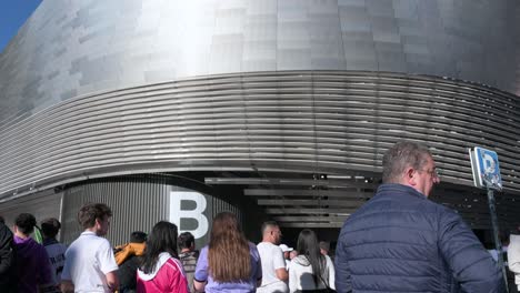 Tilting-down-view-shot-of-Real-Madrid´s-Santiago-Bernabeu-stadium-as-football-fans-attend-the-Champions-League-football-match-Between-Spanish-team-Real-Madrid-and-British-team-Manchester-City