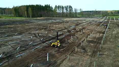 Beginning-construction-of-a-solar-panel-field---aerial-parallax