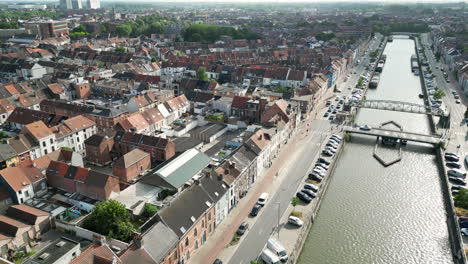 Static-Aerial-View-of-Canal-and-Traffic-Flowing-Through-Ghent-City