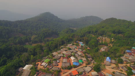 Remote-traditional-rural-village-in-the-mountains-of-Chiang-Mai,-aerial