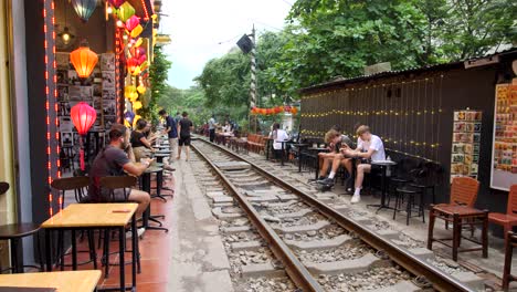 Tourists-sitting-and-waiting-on-city-trains