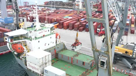 Cargo-ship-is-receiving-containers-for-shipping