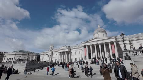 People-At-Trafalgar-Square-In-The-Morning,-London,-UK