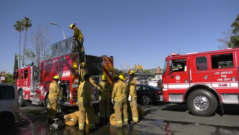 Firefighters-walk-to-truck-