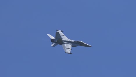 Condensation-Trail-Coming-Off-a-Fighter-Jet's-Wing-During-a-Tight-Turn