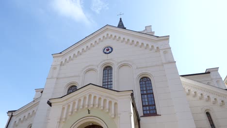 Ornate-exterior-front-of-historic-Reformed-Lutheran-temple,-low-angle