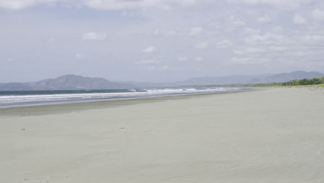 Static-shot-of-a-white-sand-beach-with-strong-wind-gusts-at-canas-island