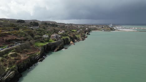 Howth-Ireland-Dublin-cliffs-drone-seaside-sunny-spring-afternoon