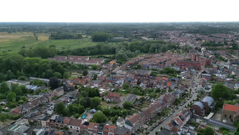 Linear-Pan-Aerial-Looking-at-Ghent-Outskirts-and-Natural-Reserve-of-Bourgoyen-Ossemeersen