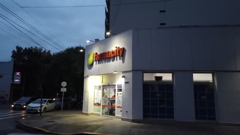 Farmacity-pharmacy-chain-store-in-buenos-aires-city-argentina-at-night-entrance-sign