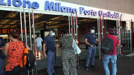 police-check-passengers-entering-Garibaldi-train-station