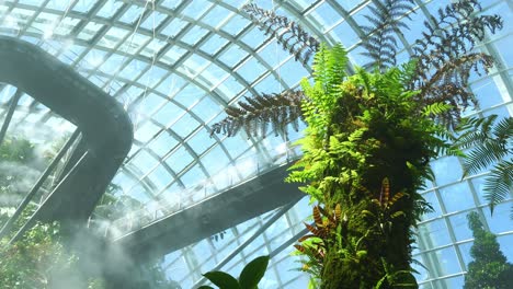 People-walking-on-cloud-forest-aerial-walkway,-greenhouse-conservatory,-glass-window-dome-building-and-blue-sky,-Gardens-by-the-bay,-the-iconic-attraction-of-Singapore