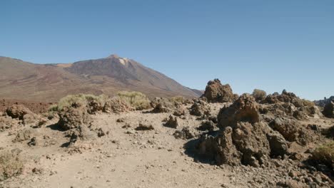 Volcanic-landscape-with-Mount-Pico-del-Teide-and-Los-Roques-de-Garcia,-Teide-National-Park-in-Tenerife,-Canary-Islands-in-spring