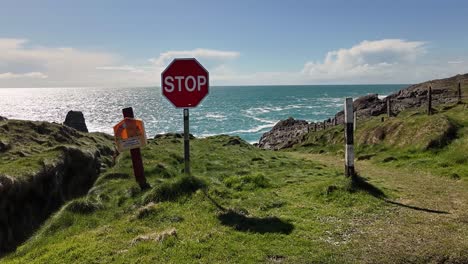 A-4K-shot-of-the-end-of-the-road-at-Dunlough-Castle-Car-Park-Mizen-Head-Peninsula-Cork-Ireland