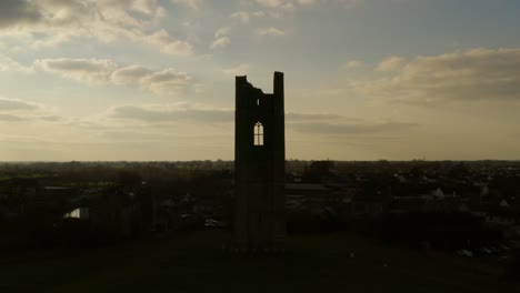 Aerial-view-of-St-Mary's-Abbey-silhouette-against-the-evening-sky
