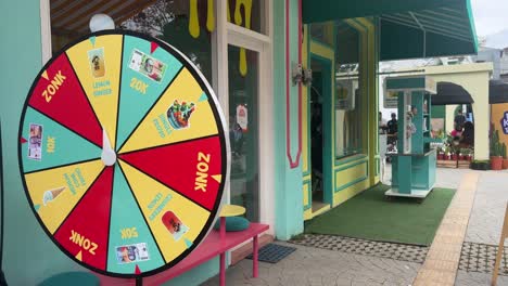 Wheel-of-Fortune-Spinning-in-Front-of-Store