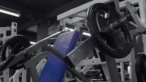 Blue-chest-press-machine-inside-a-sports-gym-club