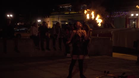 Street-artist-handling-fire-rings-at-night-show