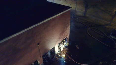 Aerial-night-view-of-a-fire-incident-at-an-abandoned-building-in-Montréal,-Québec